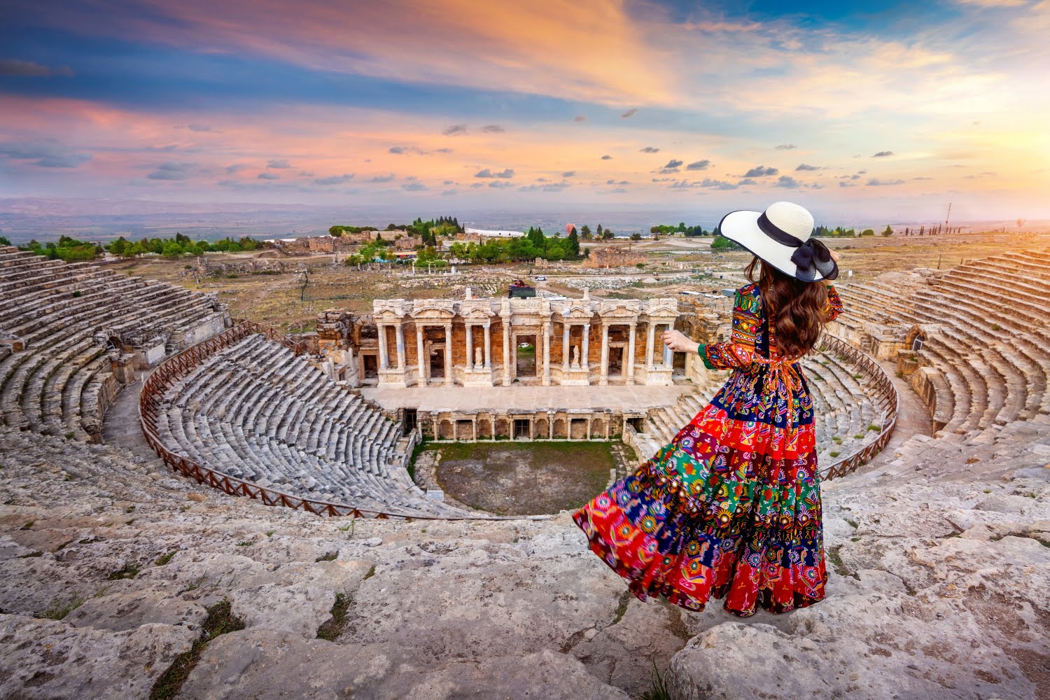 Woman standing on Hierapolis ancient city at Pamukkale in Turkey